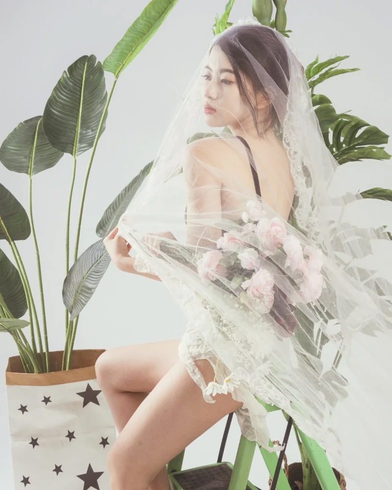 Bridal portrait with flowers and a veil